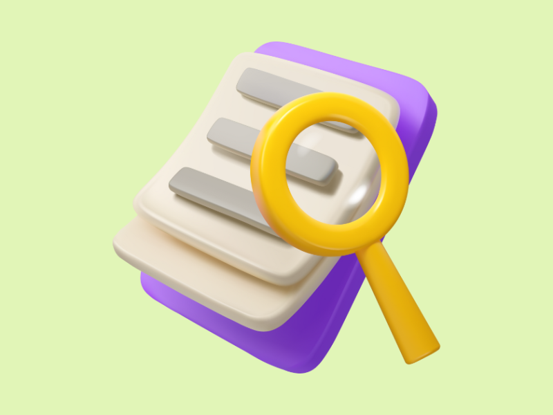 Magnifying glass on a clipboard graphic with the text